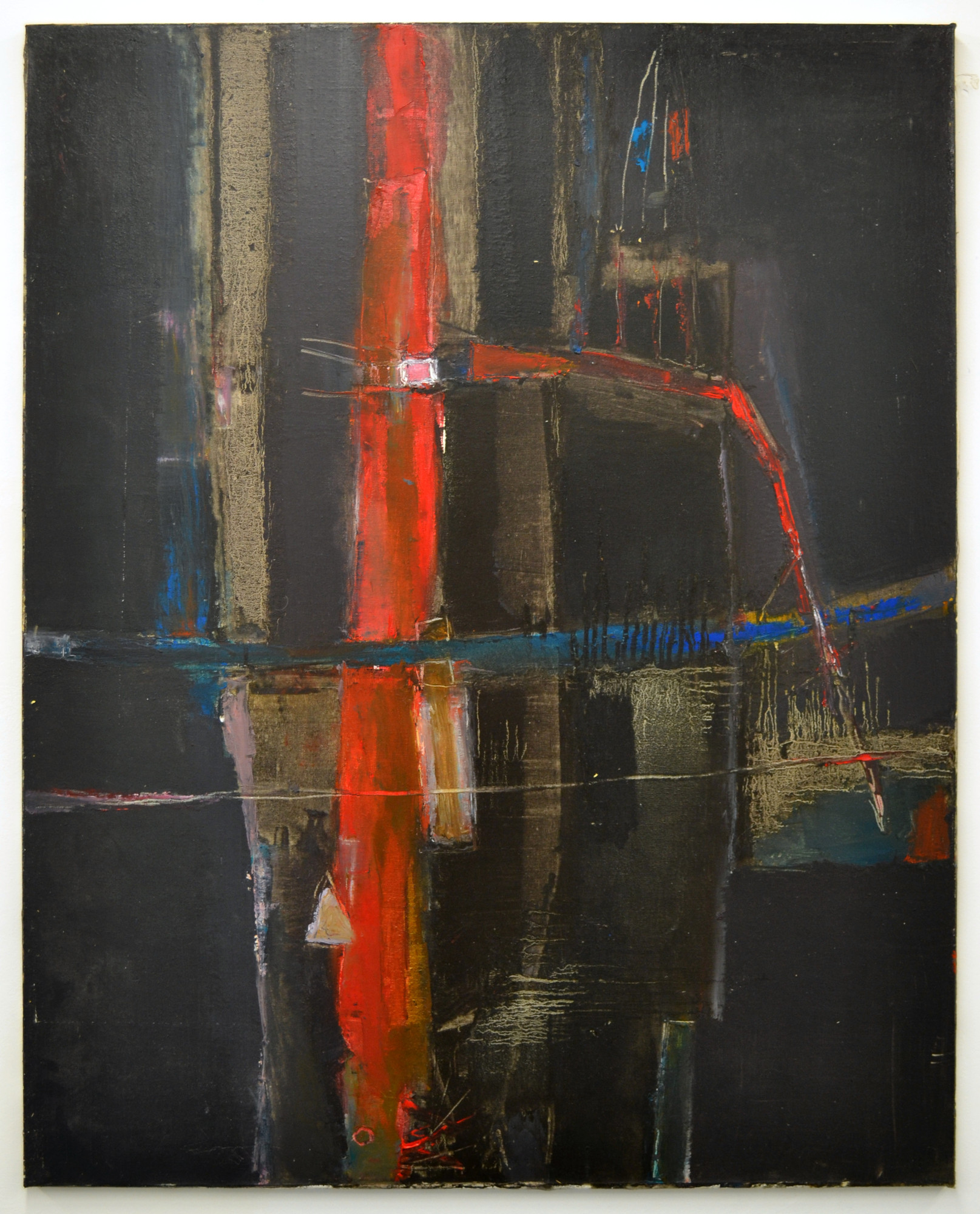 Dark abstract painting with a strong red vertical, blue horizontal strokes and ochre surface marks.